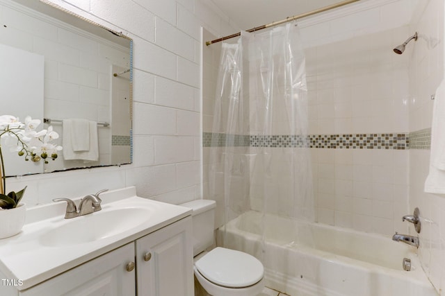 full bathroom featuring toilet, vanity, and shower / tub combo