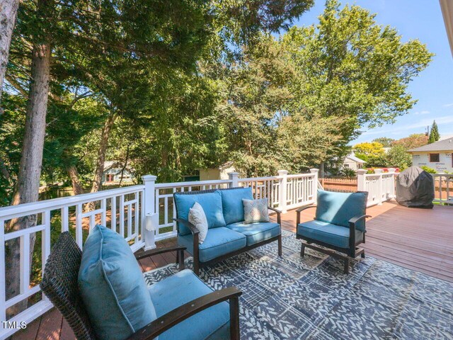 deck with an outdoor hangout area