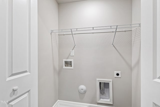 washroom with electric dryer hookup, gas dryer hookup, and hookup for a washing machine