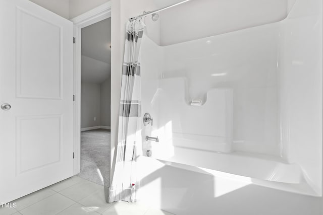 bathroom featuring shower / bath combination with curtain and tile patterned floors