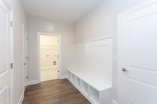 mudroom with dark hardwood / wood-style floors