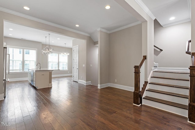 living area featuring baseboards, ornamental molding, stairway, dark wood-style floors, and an inviting chandelier