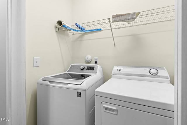 laundry room with washer and dryer