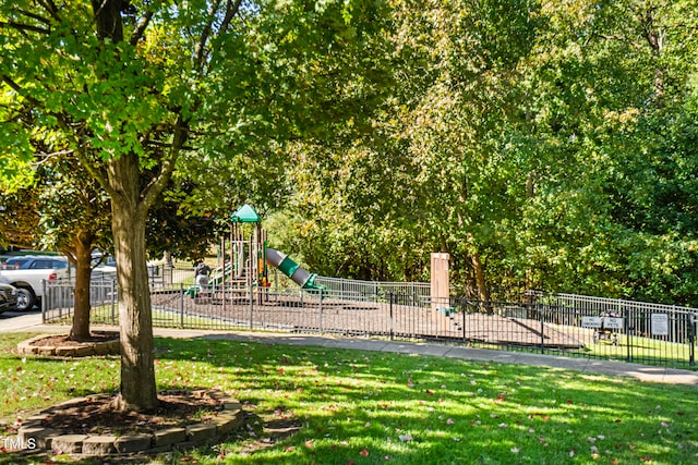 view of play area featuring a lawn