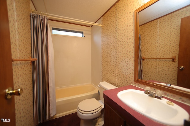 full bathroom with a textured ceiling, vanity, toilet, and shower / tub combo