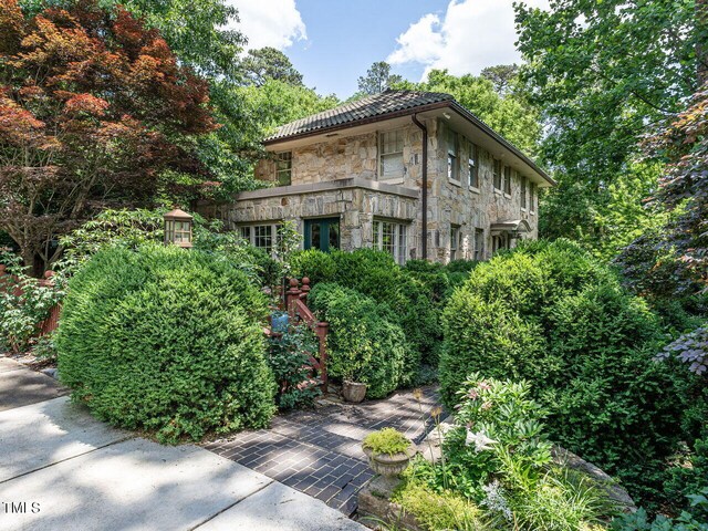 2501 Kenmore Dr, Raleigh, NC 27608 - view of home's exterior with stone siding
