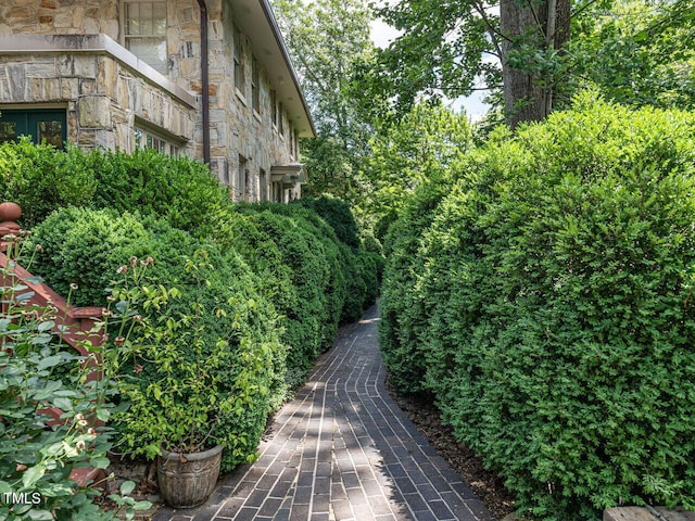 2501 Kenmore Dr, Raleigh, NC 27608 - view of home's exterior featuring stone siding