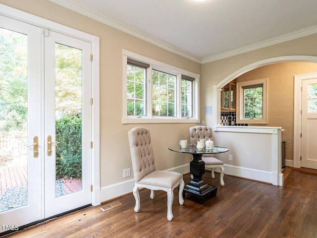 2501 Kenmore Dr, Raleigh, NC 27608 - sitting room with crown molding, wood finished floors, visible vents, and baseboards