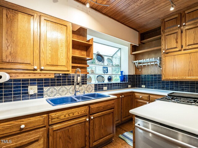 kitchen with wood-type flooring, dishwasher, tasteful backsplash, sink, and wooden ceiling