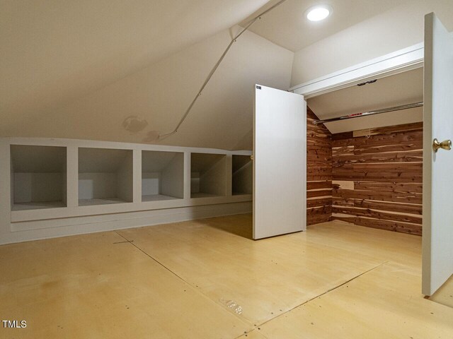 2501 Kenmore Dr, Raleigh, NC 27608 - additional living space featuring recessed lighting, wood walls, and vaulted ceiling