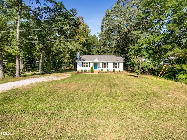 view of front of home featuring a front yard