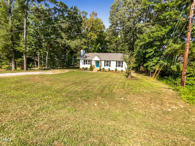 view of front of home with a front lawn