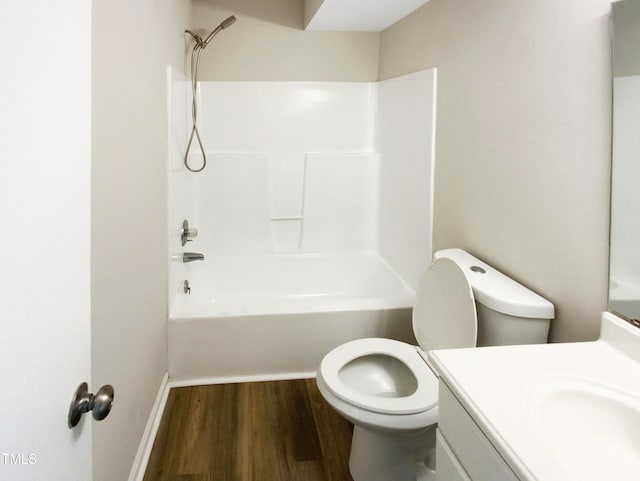 full bathroom with vanity, toilet, wood-type flooring, and shower / bathtub combination