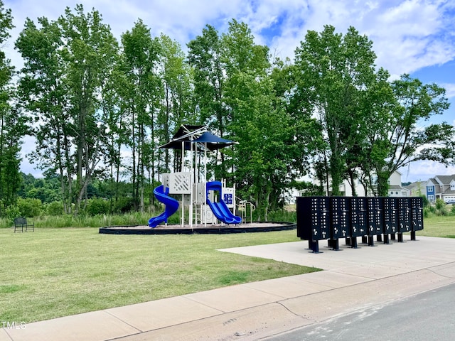 view of play area featuring a lawn