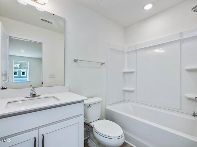 bathroom with visible vents, toilet, recessed lighting, bathing tub / shower combination, and vanity