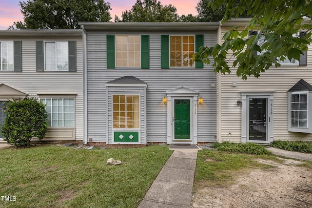 view of property with a lawn