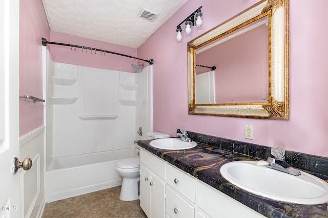 full bathroom with toilet, bathing tub / shower combination, a textured ceiling, and vanity