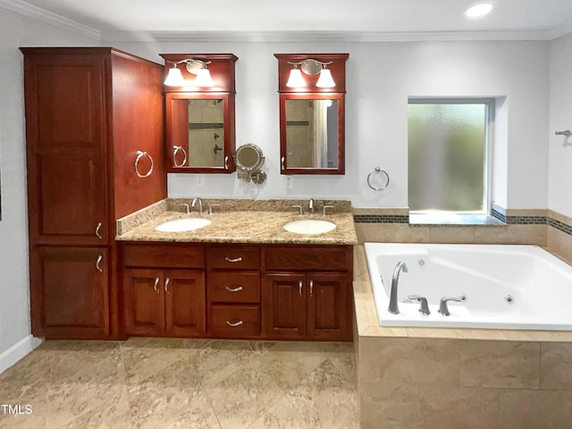 bathroom featuring a sink, ornamental molding, and a whirlpool tub