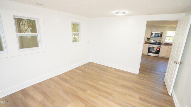 empty room featuring light wood-type flooring