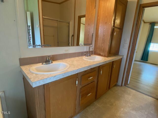 bathroom featuring vanity and hardwood / wood-style floors