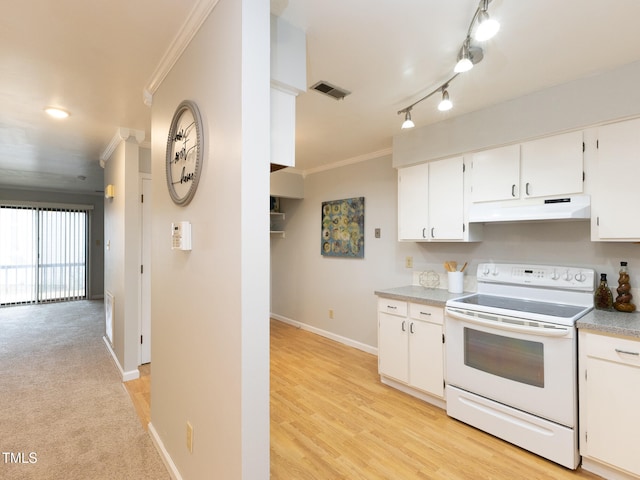 kitchen featuring track lighting, white electric range, crown molding, light wood-type flooring, and white cabinetry