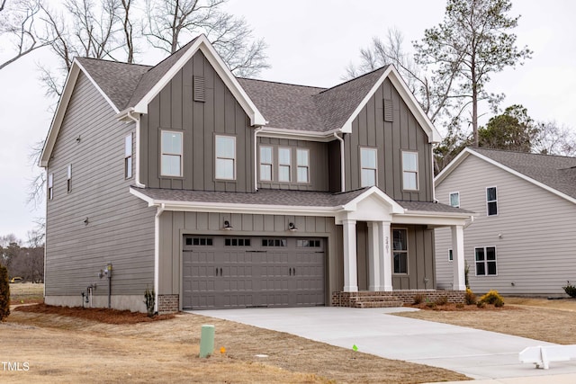 view of front of home featuring brick siding, board and batten siding, concrete driveway, and an attached garage