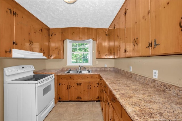 kitchen featuring white electric stove, a textured ceiling, and sink