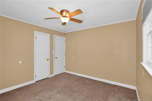 unfurnished bedroom featuring crown molding, a textured ceiling, ceiling fan, and carpet flooring