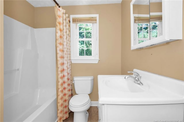 full bathroom with toilet, tile patterned flooring, vanity, a textured ceiling, and shower / bath combo with shower curtain