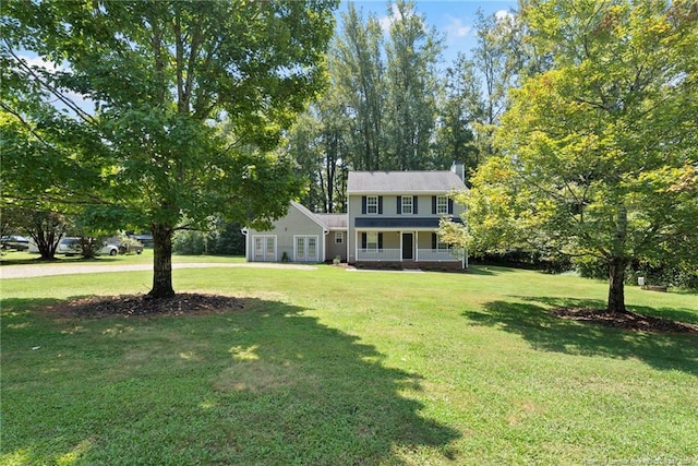 view of front of home featuring a front lawn and a porch