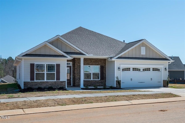 craftsman inspired home featuring a garage