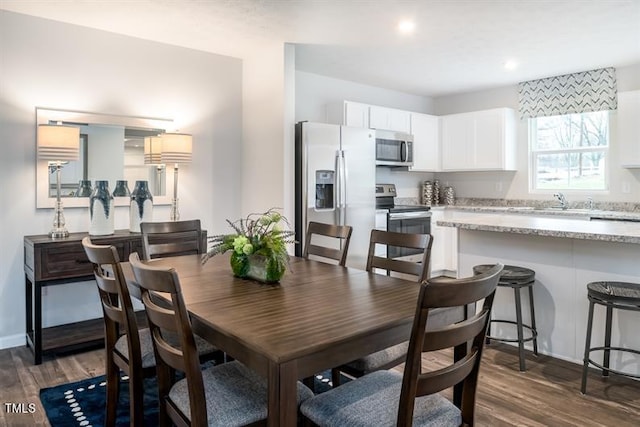 dining room featuring dark hardwood / wood-style floors