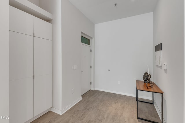 bedroom featuring a closet and light hardwood / wood-style floors