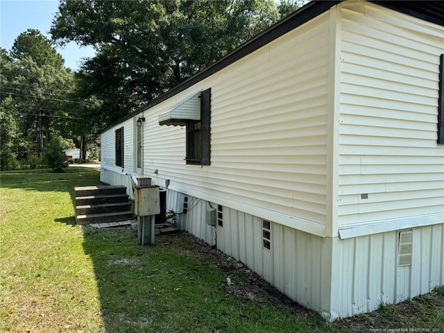 view of property exterior with a yard