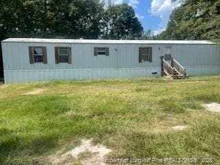 1644 Henry Berry Rd 1642, Rowland, NC 28383 - manufactured / mobile home featuring a front yard