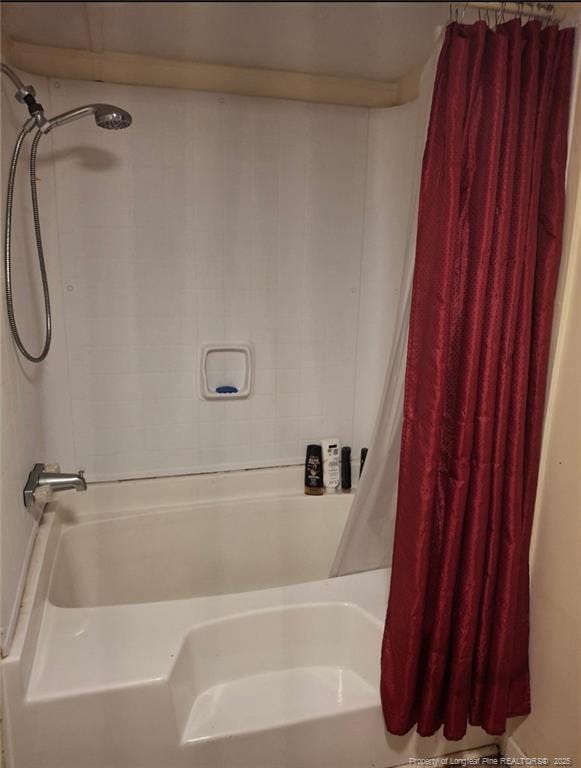 1644 Henry Berry Rd 1642, Rowland, NC 28383 - full bathroom featuring shower / tub combo with curtain