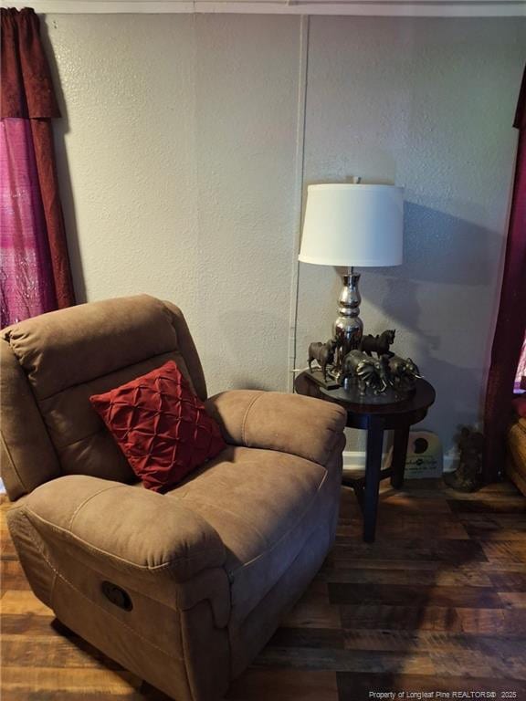 1644 Henry Berry Rd 1642, Rowland, NC 28383 - living area featuring wood finished floors and a textured wall
