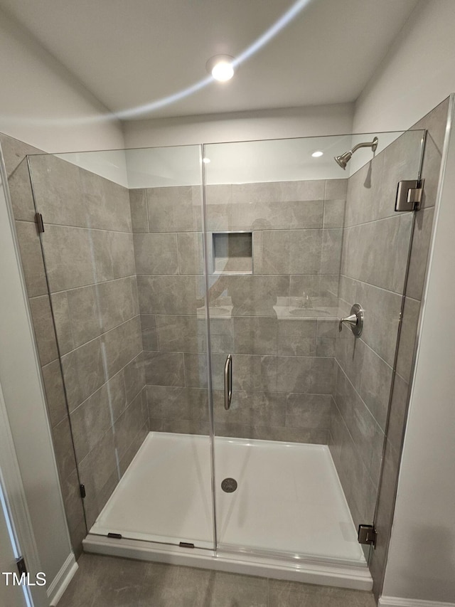full bathroom with a stall shower