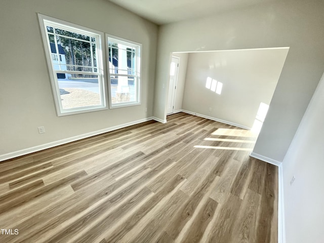 unfurnished room featuring light wood-type flooring