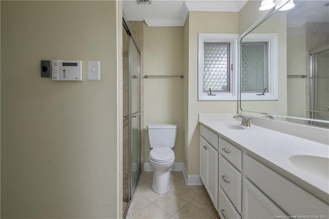 bathroom featuring tile patterned flooring, an enclosed shower, vanity, and toilet