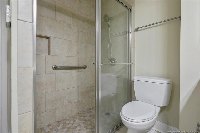 2116 Winterlochen Rd, Fayetteville, NC 28305 - full bath with a shower stall and toilet