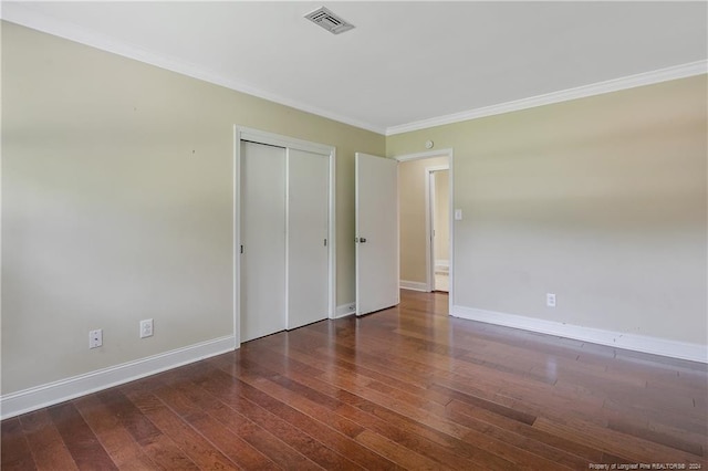 2116 Winterlochen Rd, Fayetteville, NC 28305 - unfurnished bedroom with hardwood / wood-style floors, baseboards, and visible vents