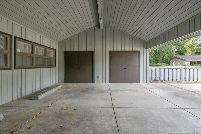 garage with wood walls