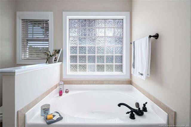 bathroom featuring a tub