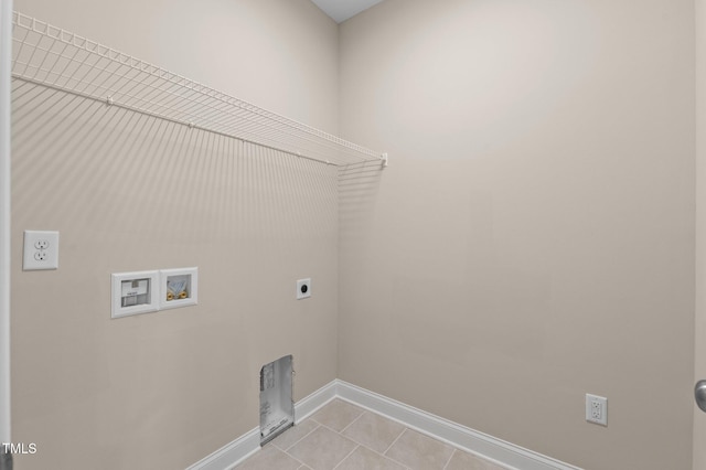 laundry room featuring hookup for a washing machine, light tile patterned floors, and hookup for an electric dryer