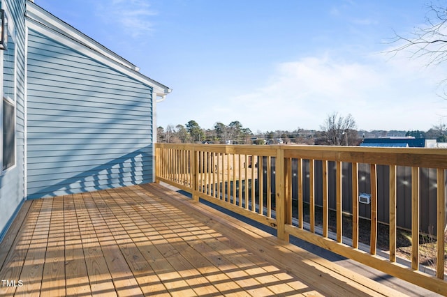 wooden deck featuring a water view