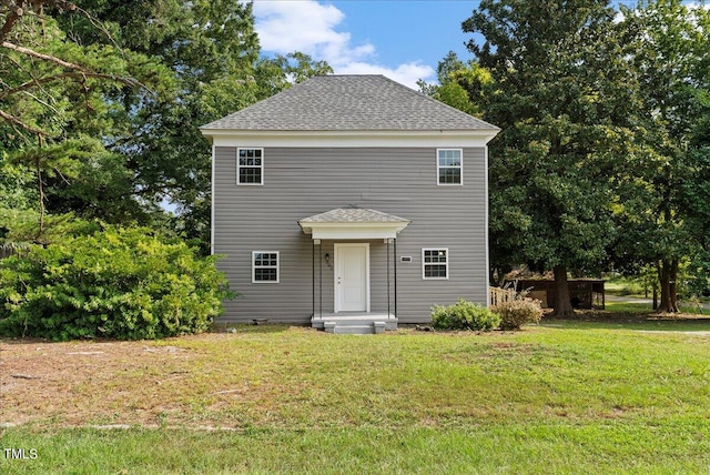 view of front of house with a front lawn