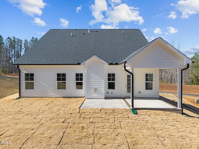 rear view of property with a patio area