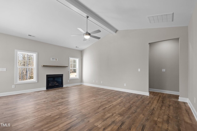 unfurnished living room featuring dark wood-type flooring, ceiling fan, and lofted ceiling with beams