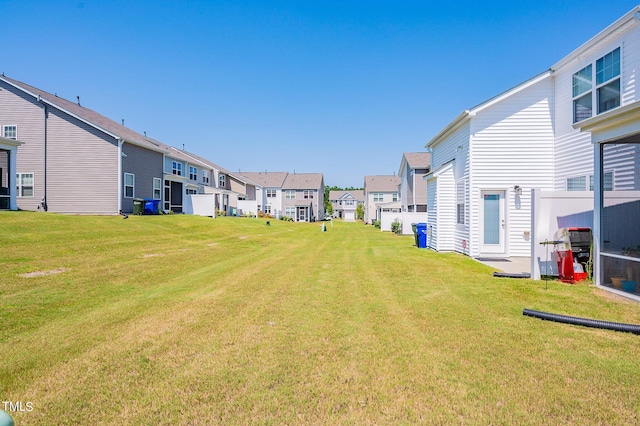 view of yard featuring a residential view